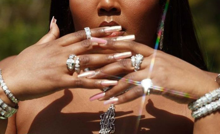 Grammy Awards Presenter & 3-Time Winner Lizzo Shines in her Shimmering Nail Look Using OPI