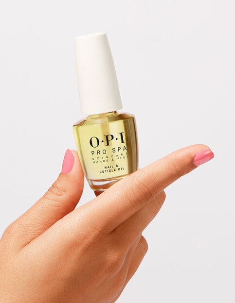 OPI ProSpa Nail & Cuticle Oil Hand and Bottle